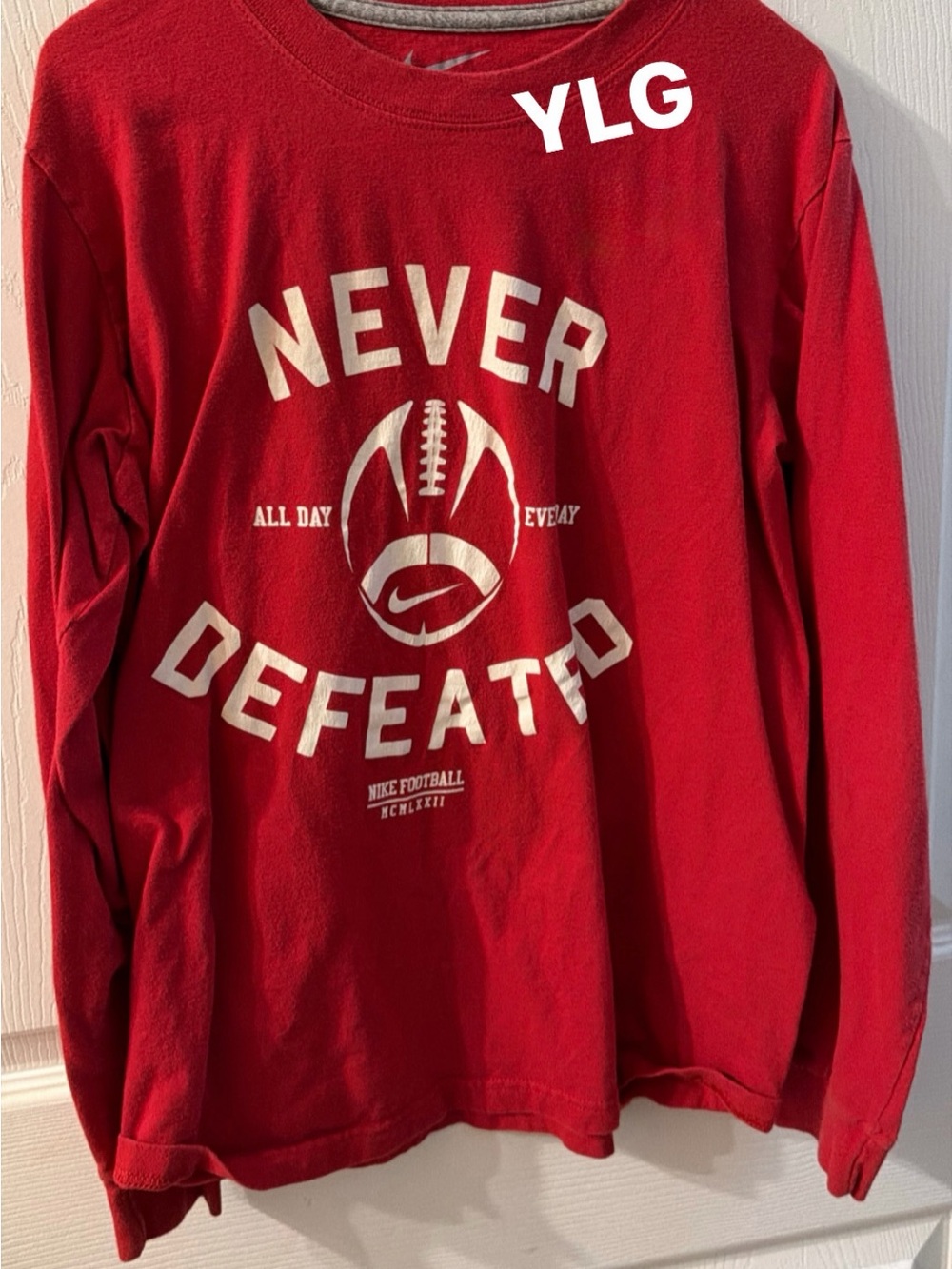 Nike Red Long Sleeve 'Never Defeated' Graphic Tee
